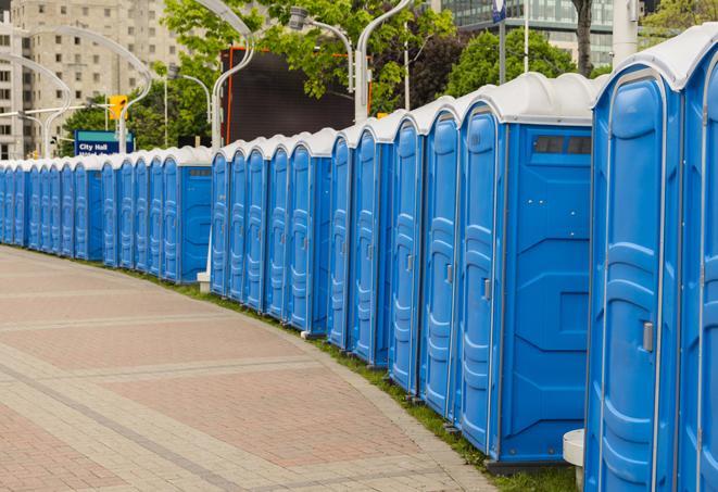 a row of sleek and modern portable restrooms at a special outdoor event in Chana, IL